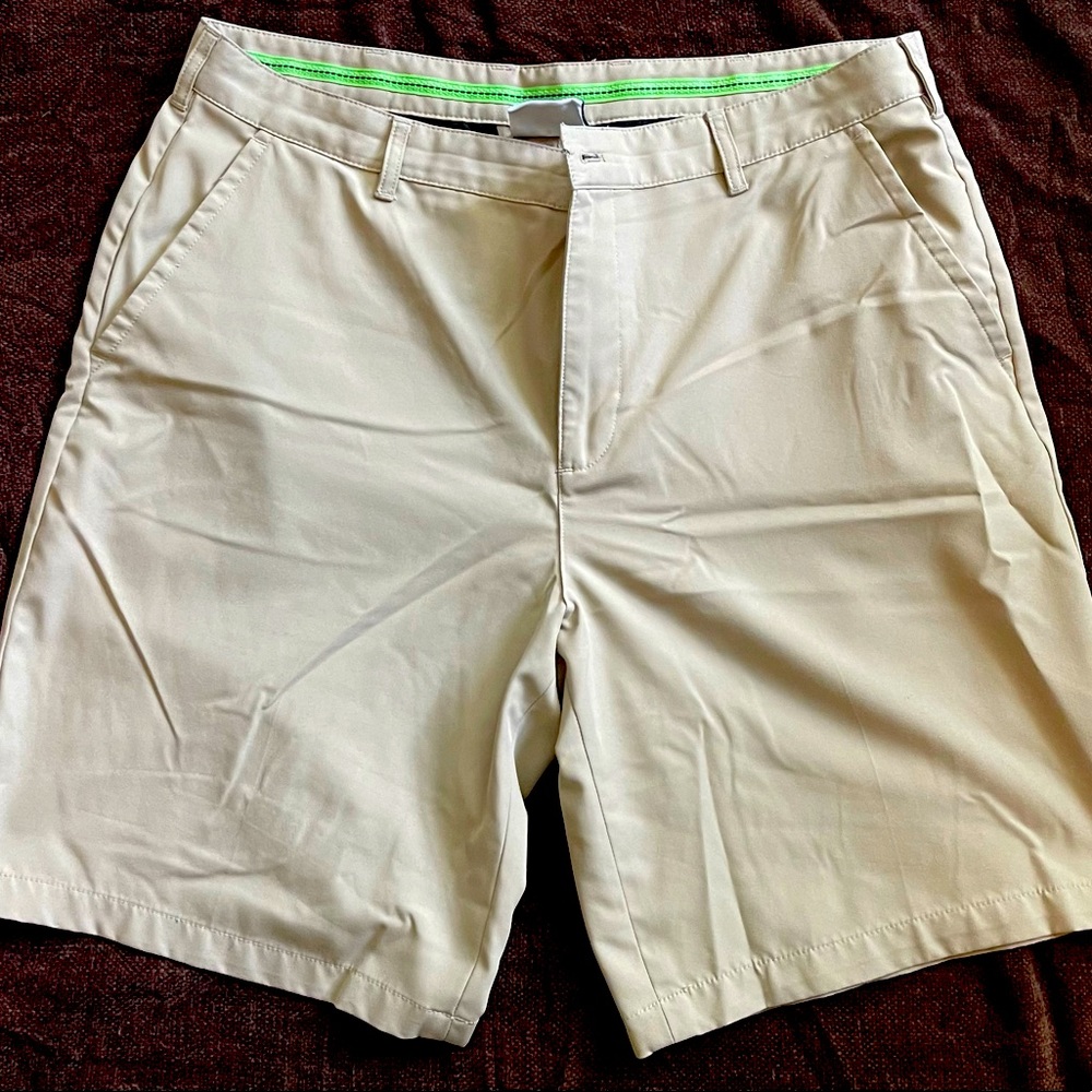 Izod Golf Solid Flat Front Shorts - image 1